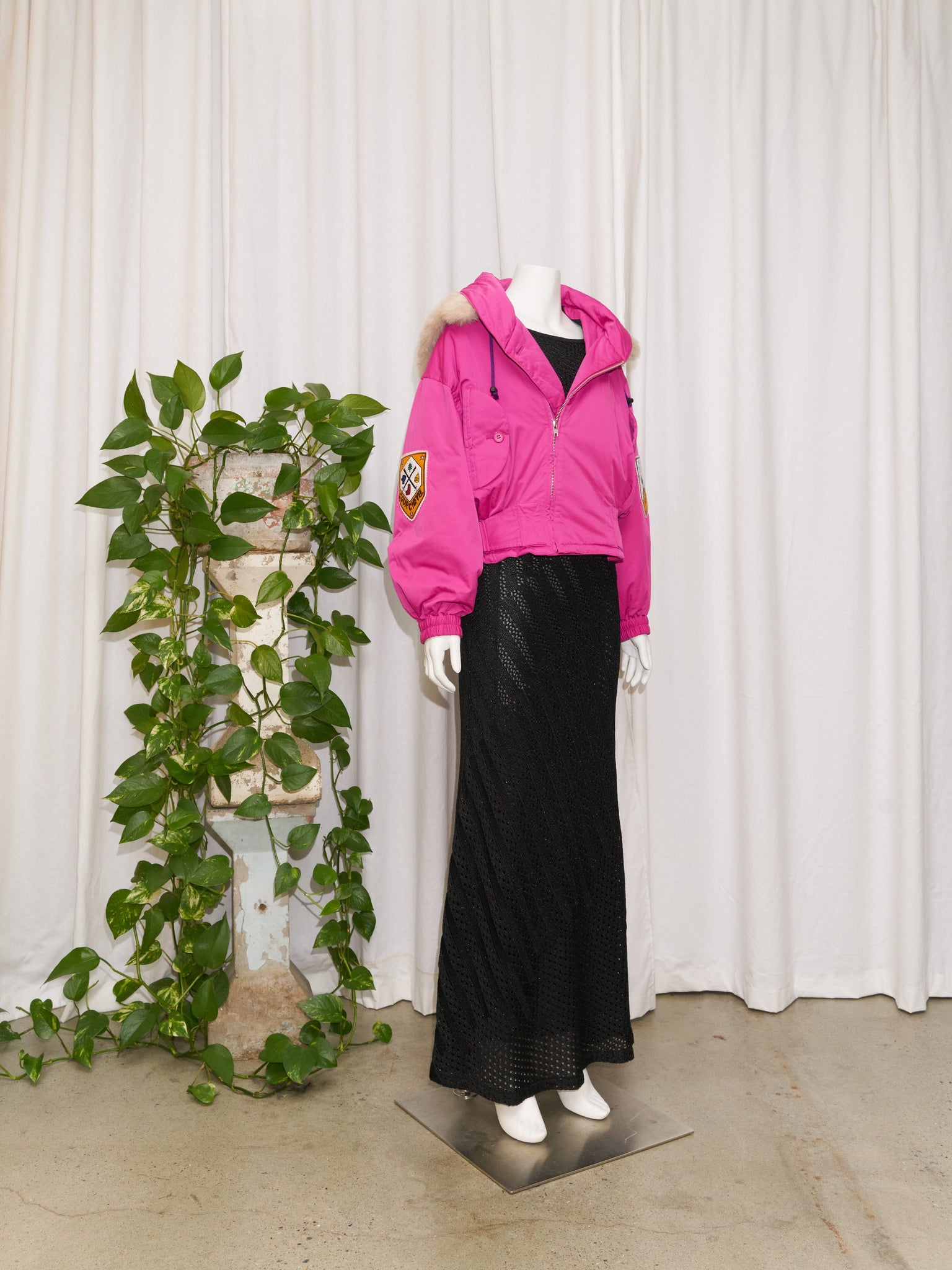 Quinn wears no. 4: salvatore ferragamo evening dress and jean-charles de castelbajac ski jacket