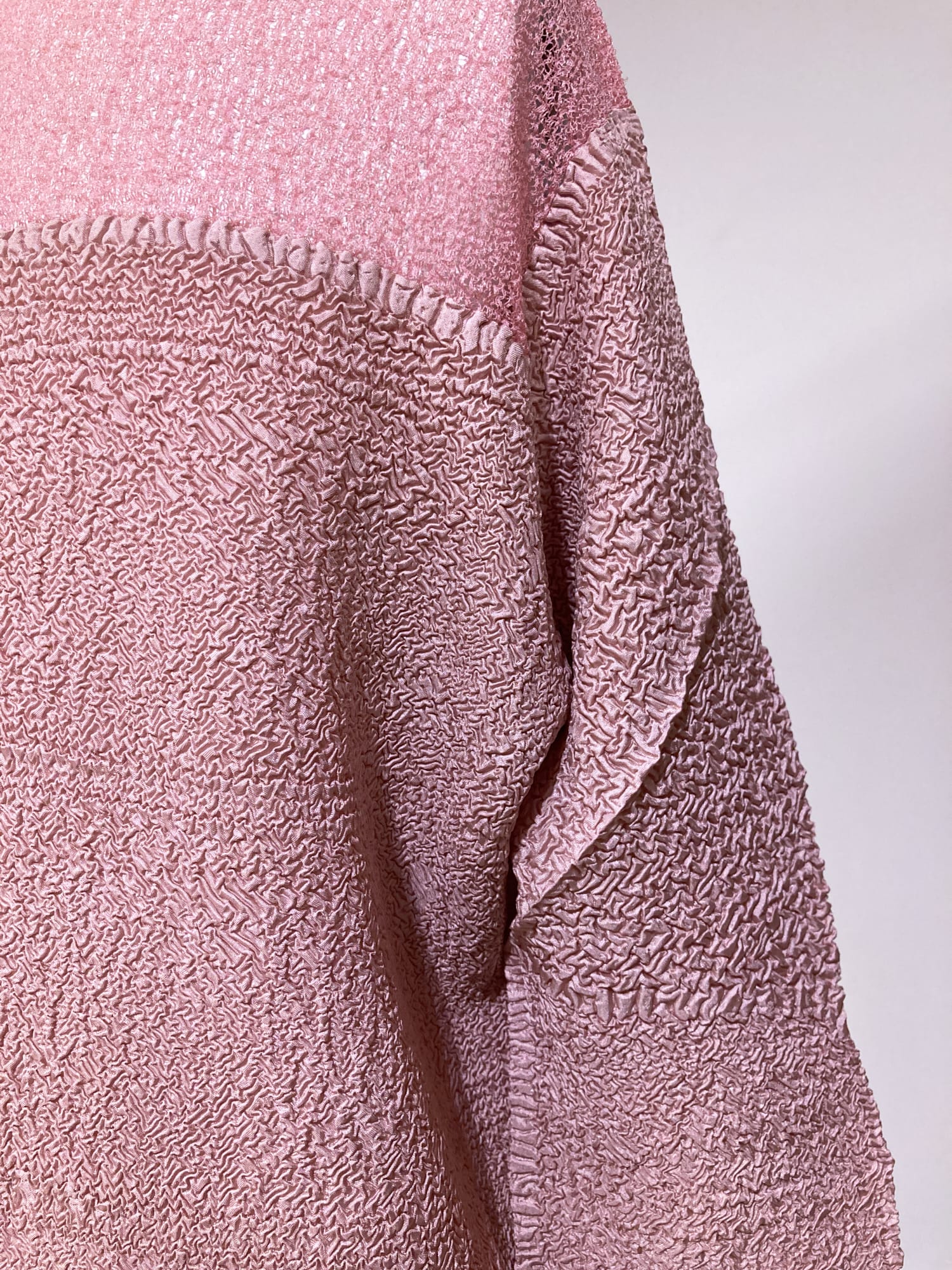 Wrinqle Inoue Pleats pink wrinkled poly mock neck top with sheer shoulder panel