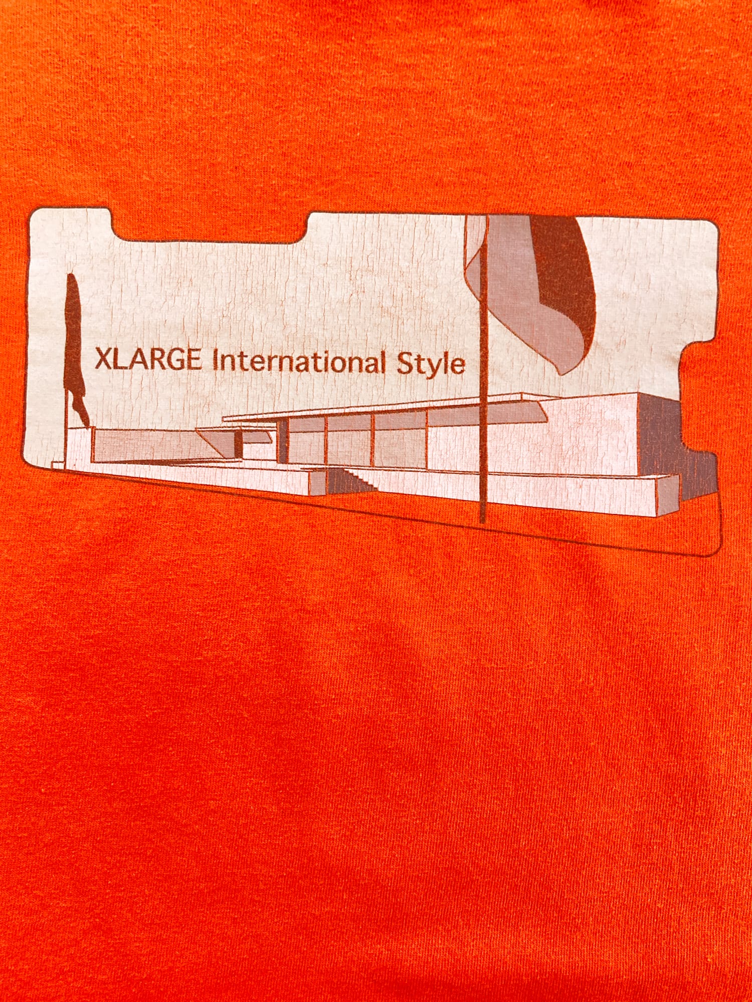 X-LARGE 1990s fluorescent orange ‘International Style’ graphic logo t-shirt