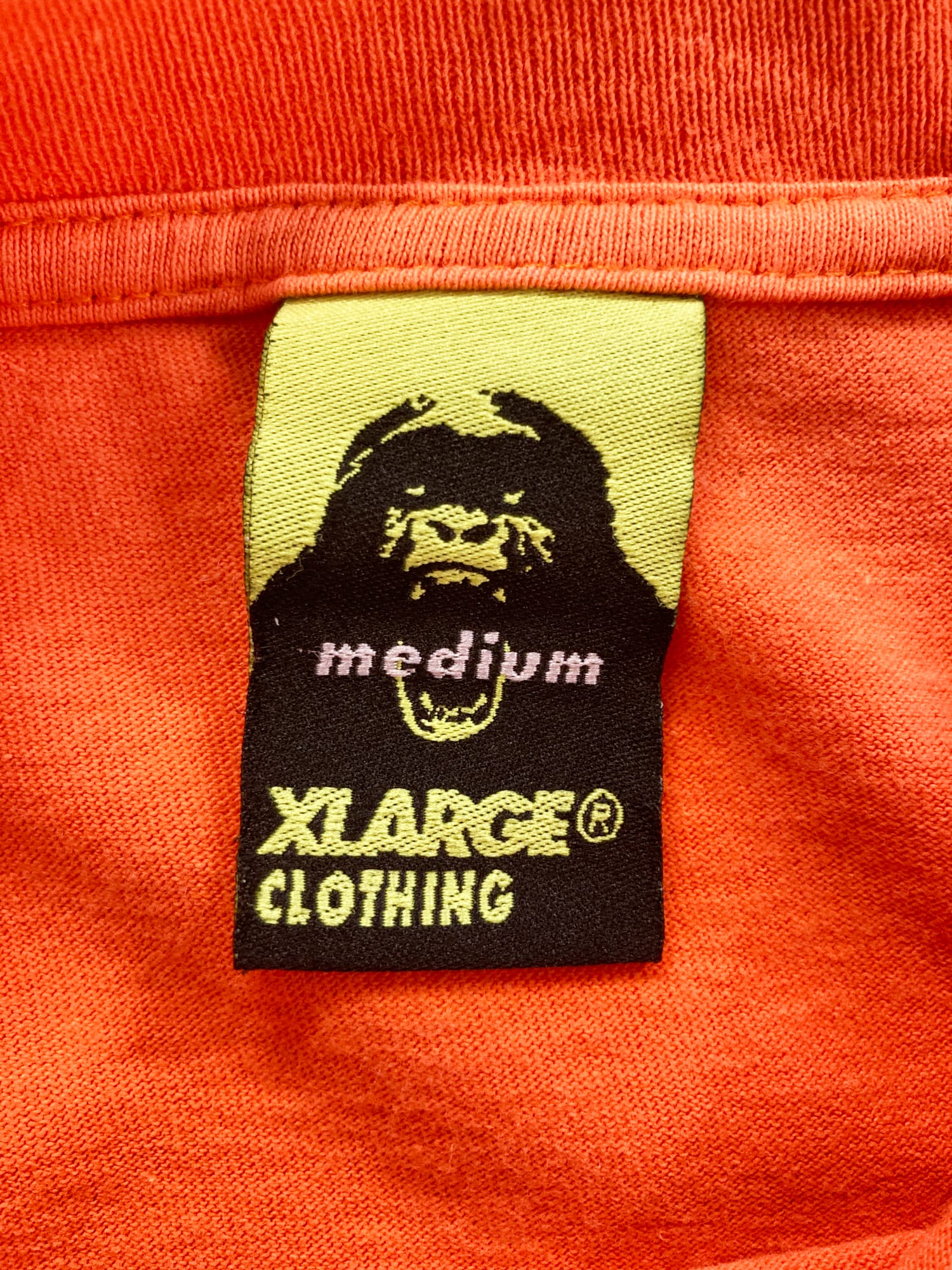 X-LARGE 1990s fluorescent orange ‘International Style’ graphic logo t-shirt