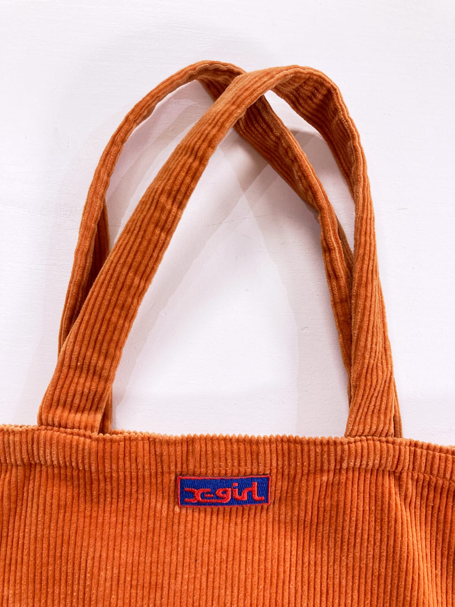 X-Girl Kim Gordon Daisy von Furth 1990s burnt orange corduroy logo tote bag