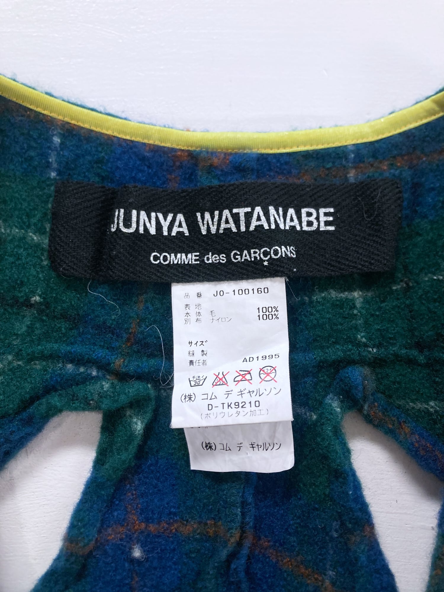 Junya Watanabe spring 1996 green plaid boiled wool slashed cut out mini dress