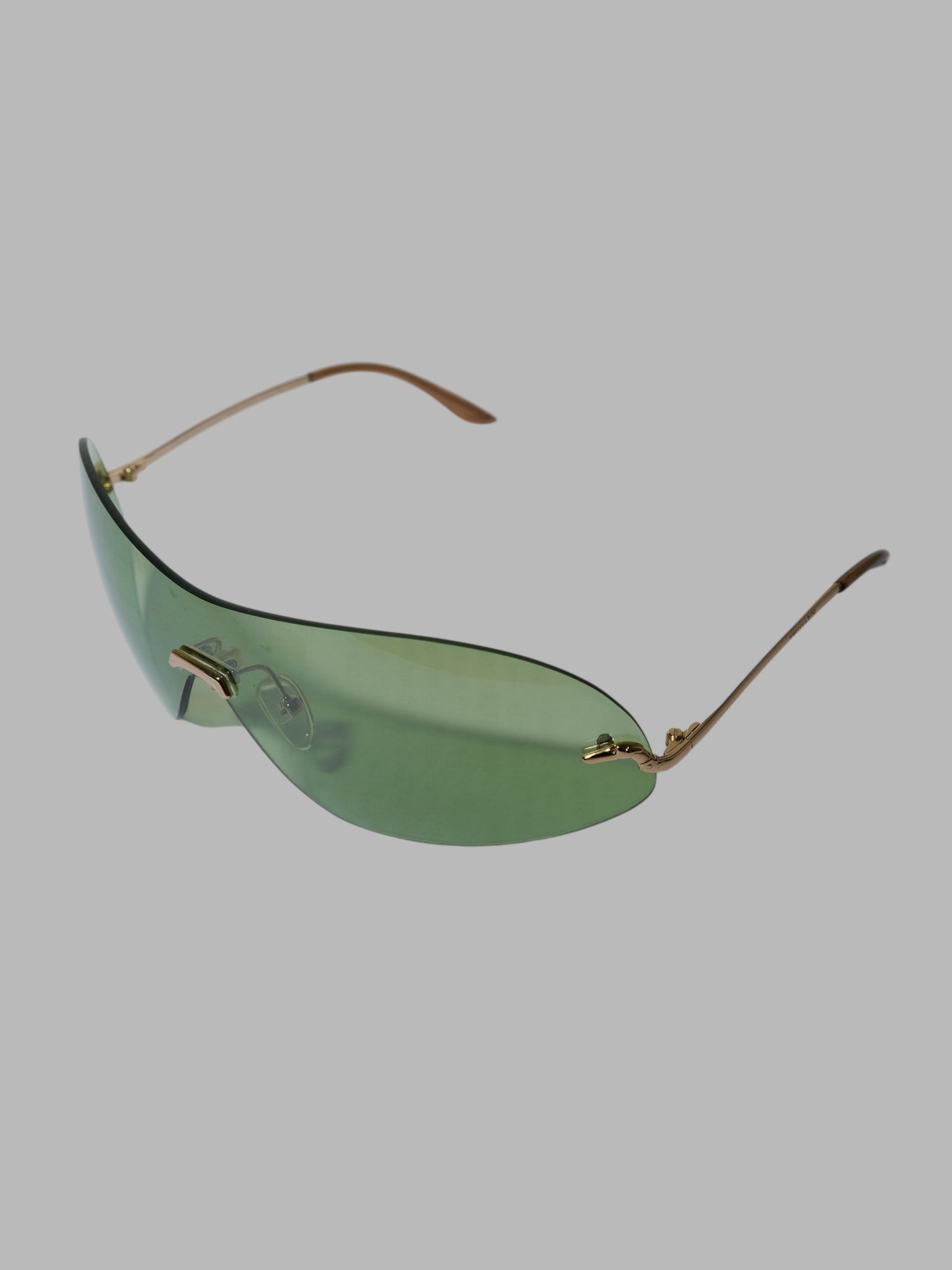 Trussardi early 2000s green rimless lens wraparound sunglasses