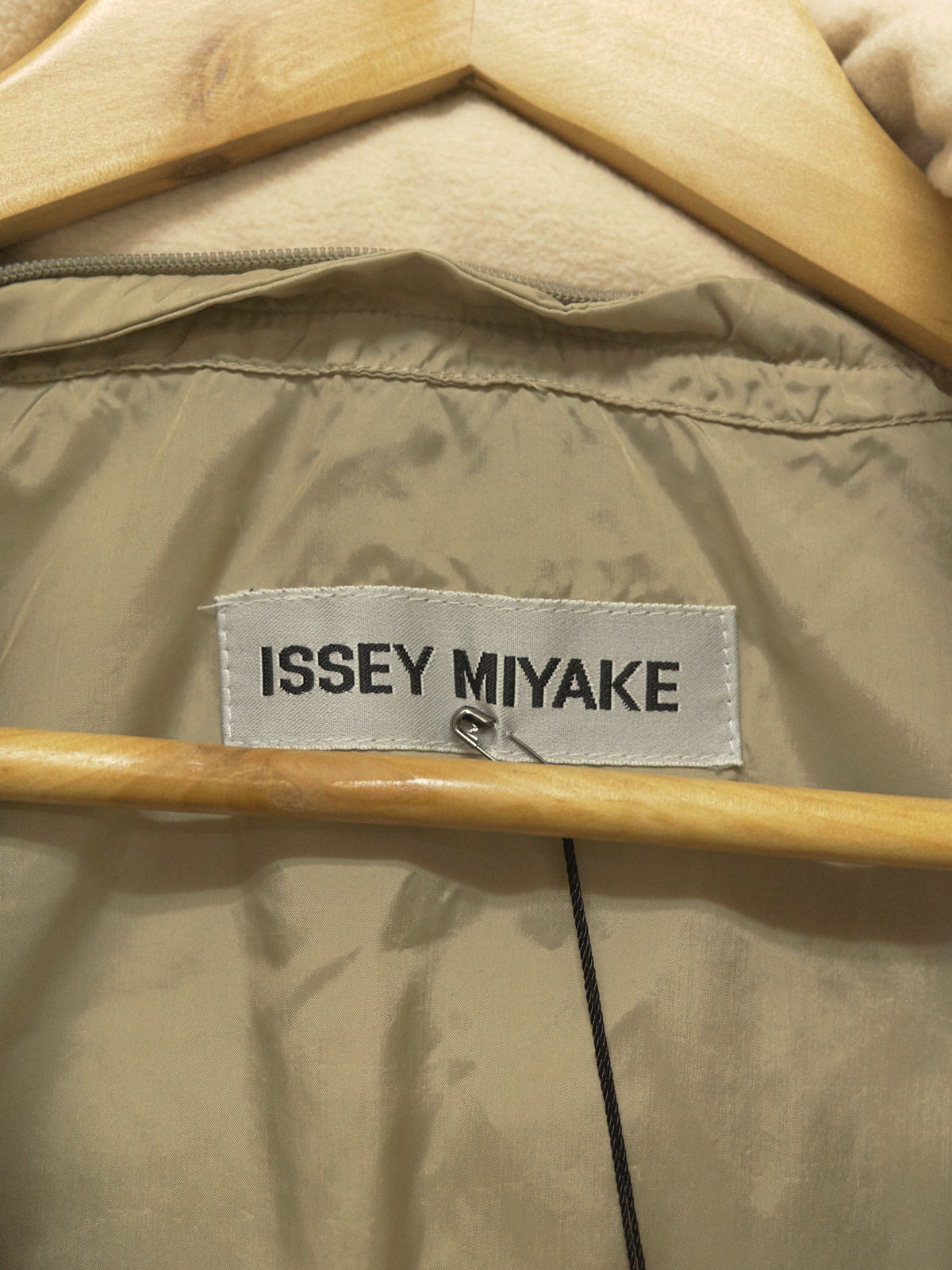 Issey Miyake beige high neck down puffer coat - size M