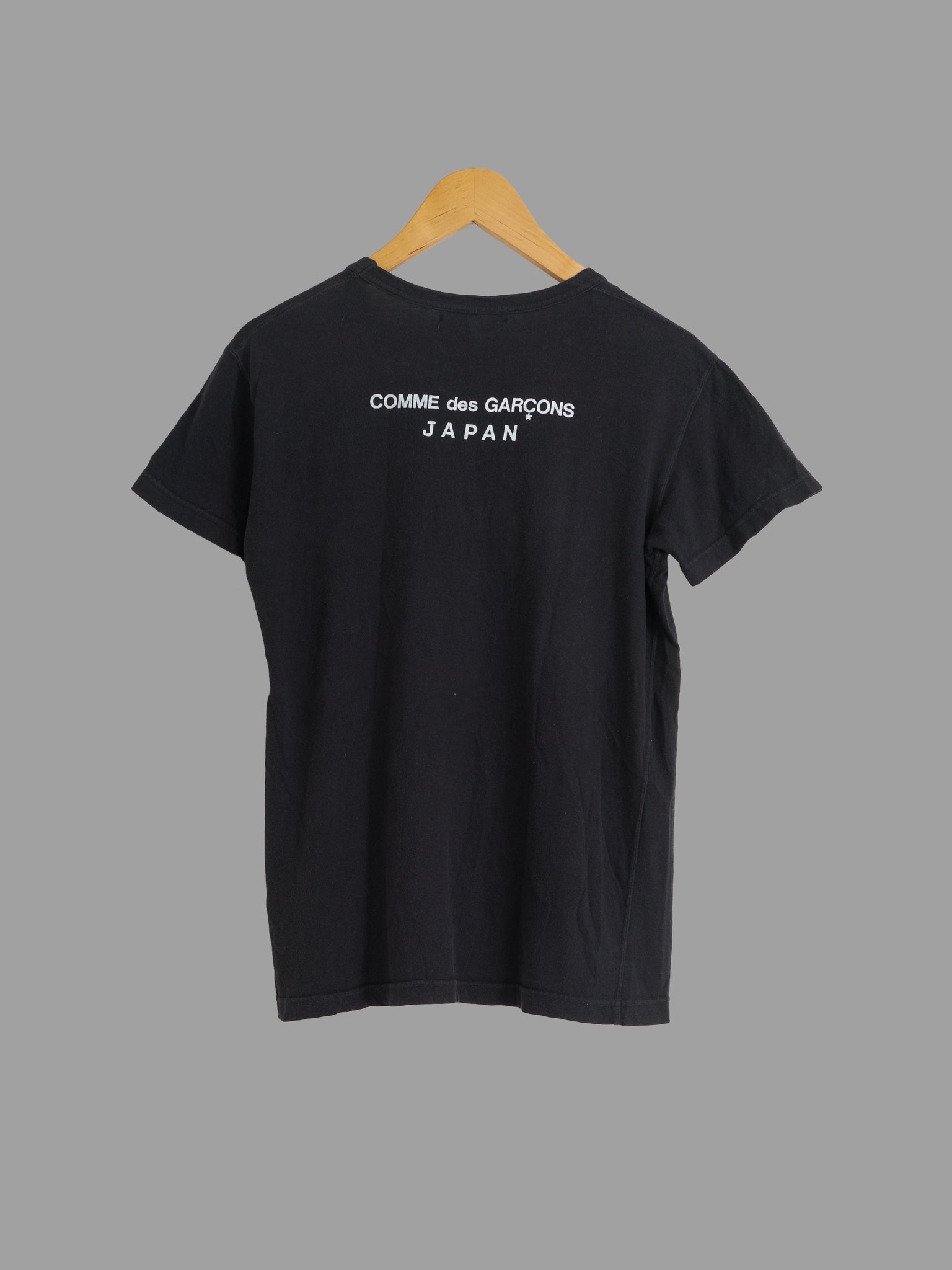 Comme des Garcons 1980s faded black cotton jersey 'CDG JAPAN' back print tshirt