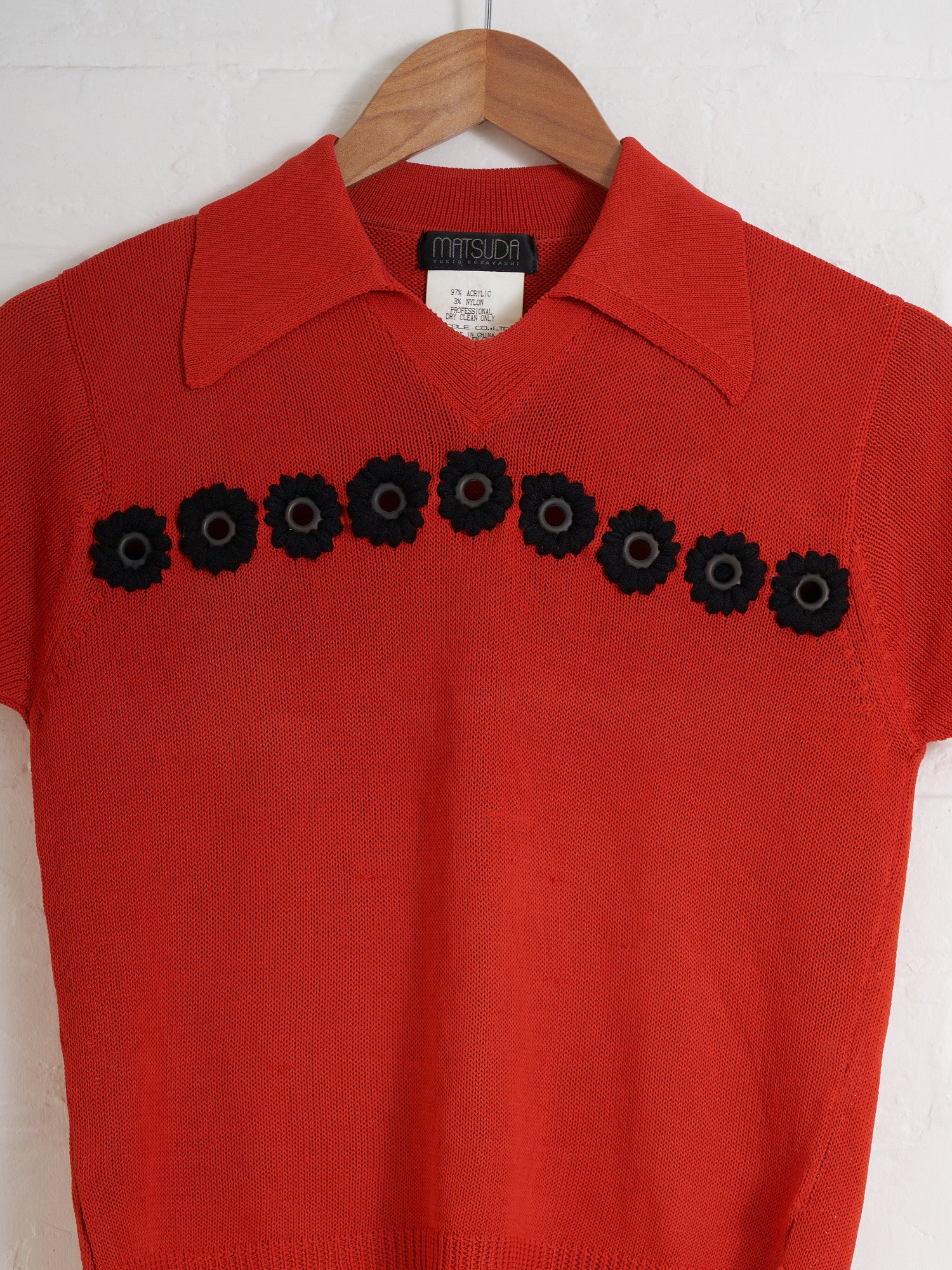 Matsuda Yukio Kobayashi 1980s burnt orange knit polo shirt with eyelet flowers