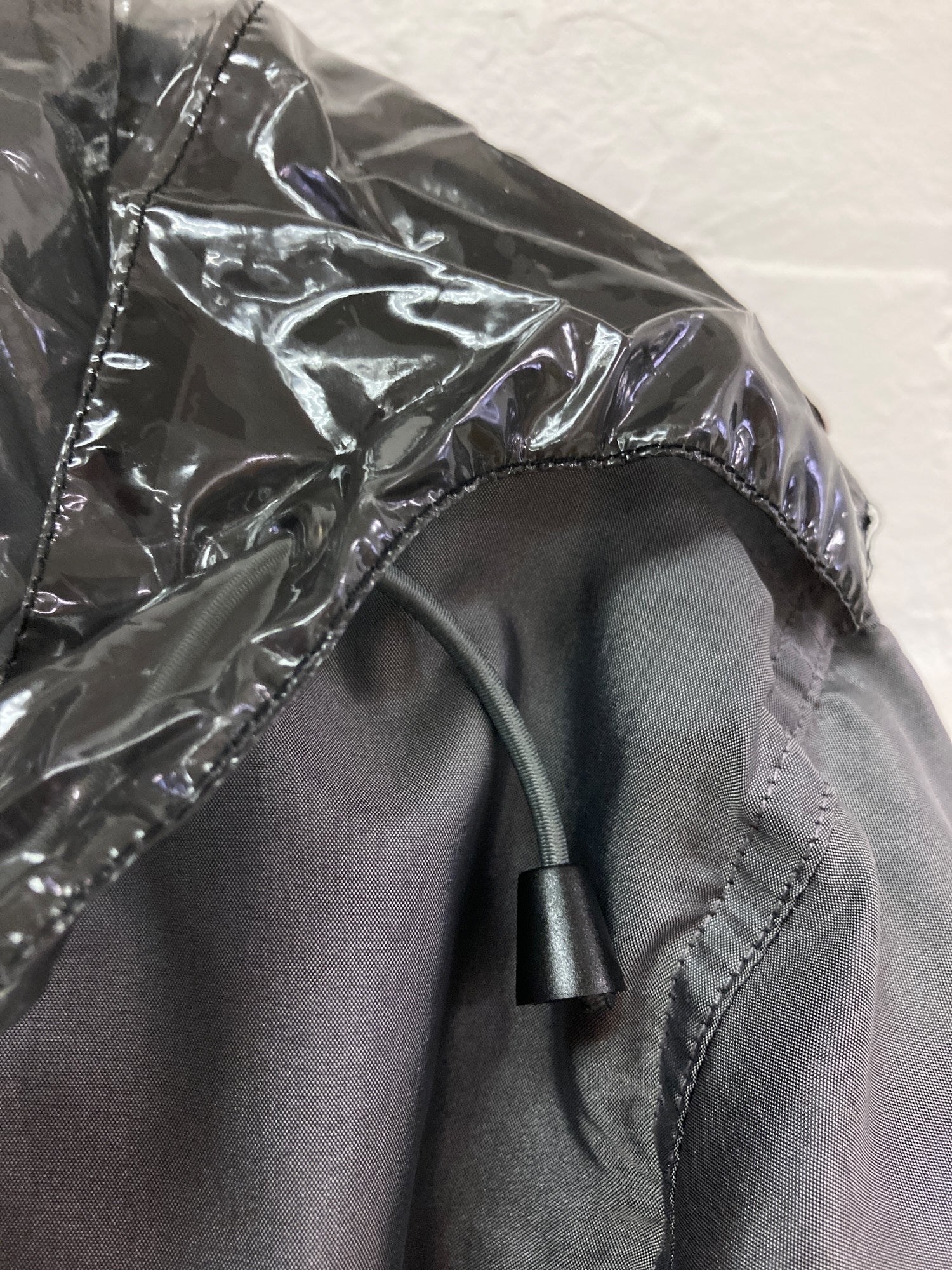 Kenzo Homme 1990s silver down puffer jacket with clear plastic hood - size 2 M