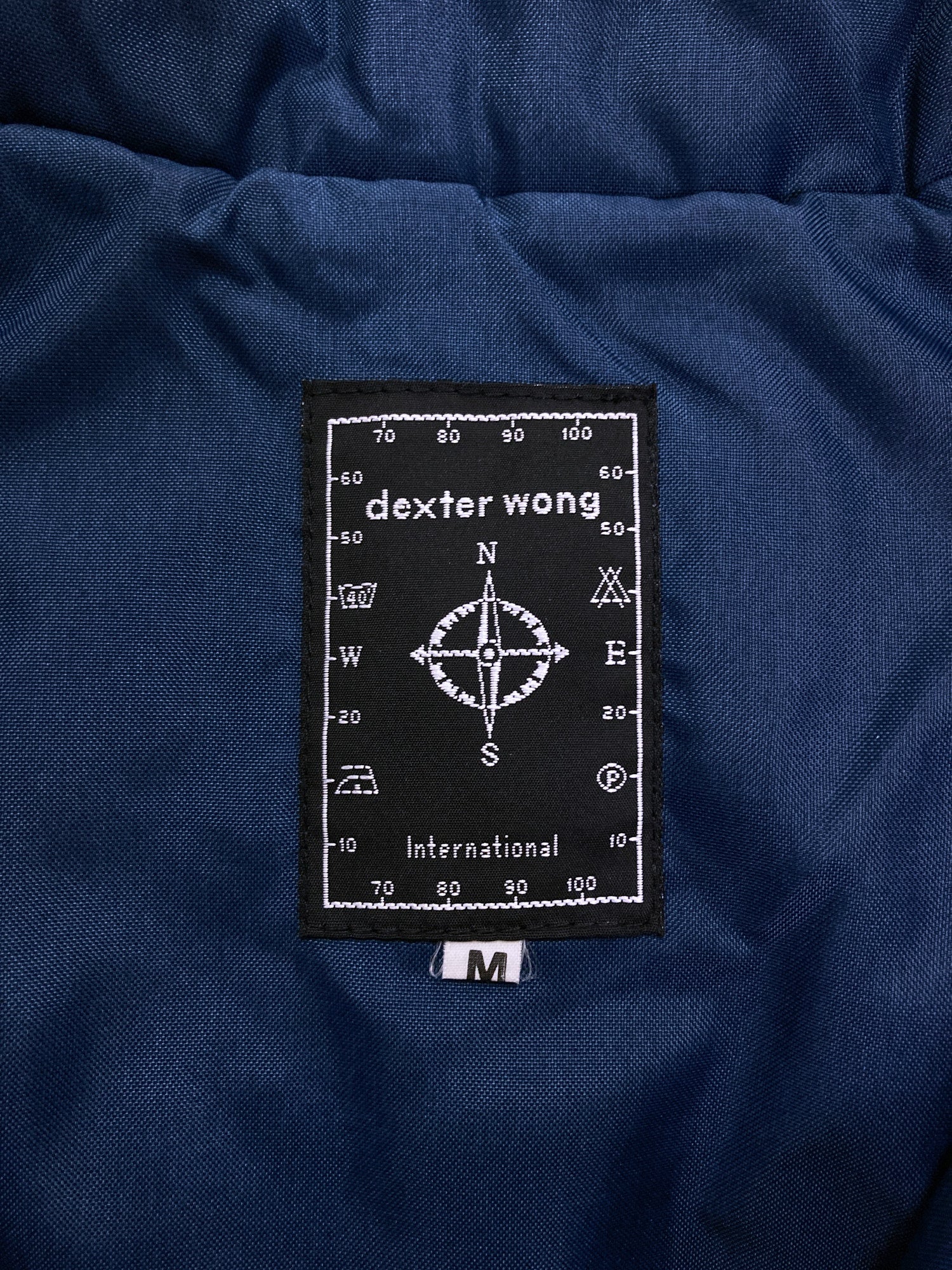 Dexter Wong 1990s blue nylon high neck bomber jacket with target 