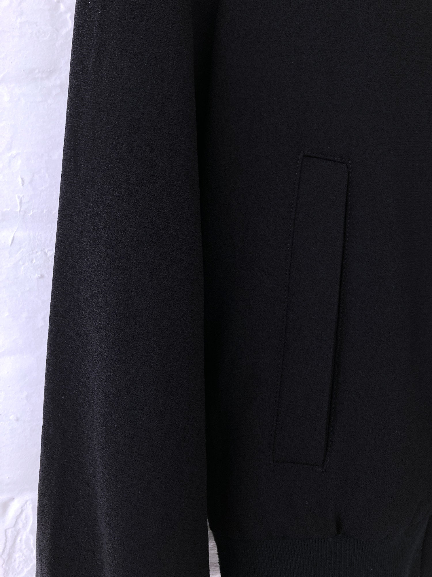 Tricot Comme des Garcons 1995 black zip jacket with security tag