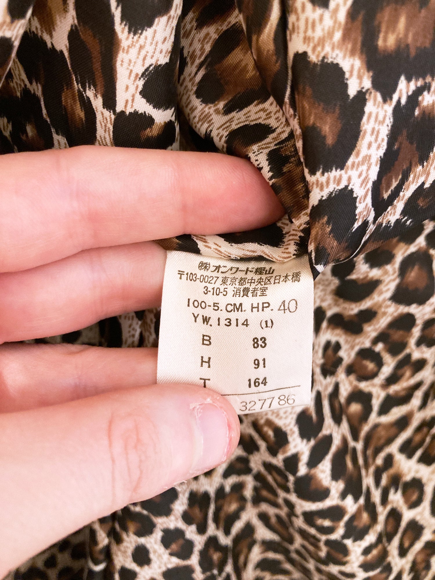 Portfolio by Jean Colonna cream nylon zip coat with leopard print lining