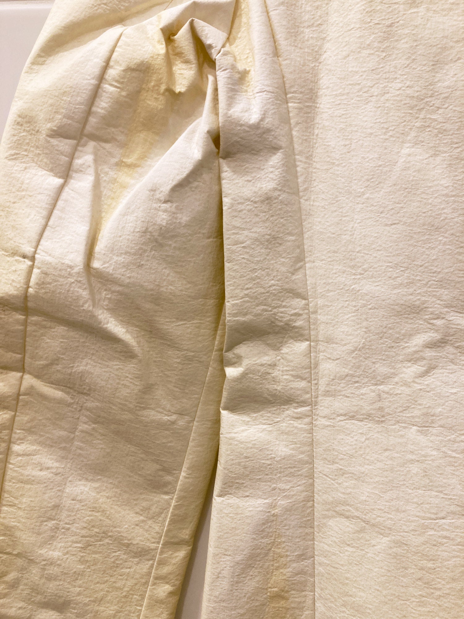 Jean Colonna cream paper-y vinyl covered placket coat - size 38