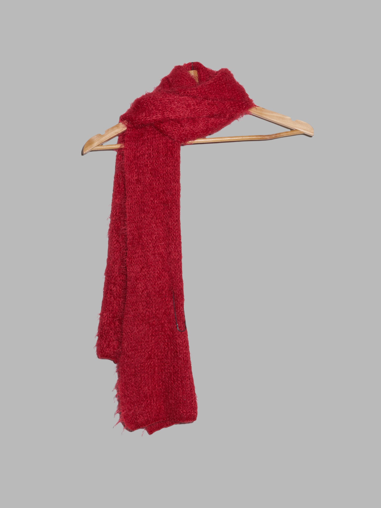 Jean Colonna red mohair-y scarf with safety pin