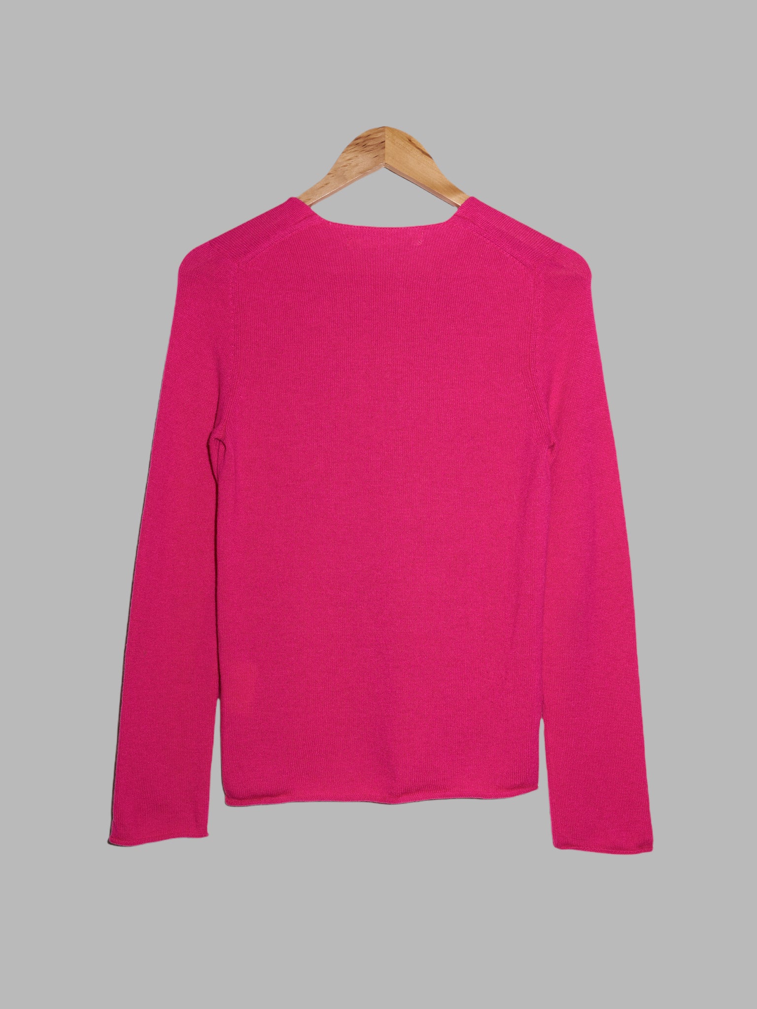 Comme des Garcons AW2000 pink wool knit sweater with eyes on front