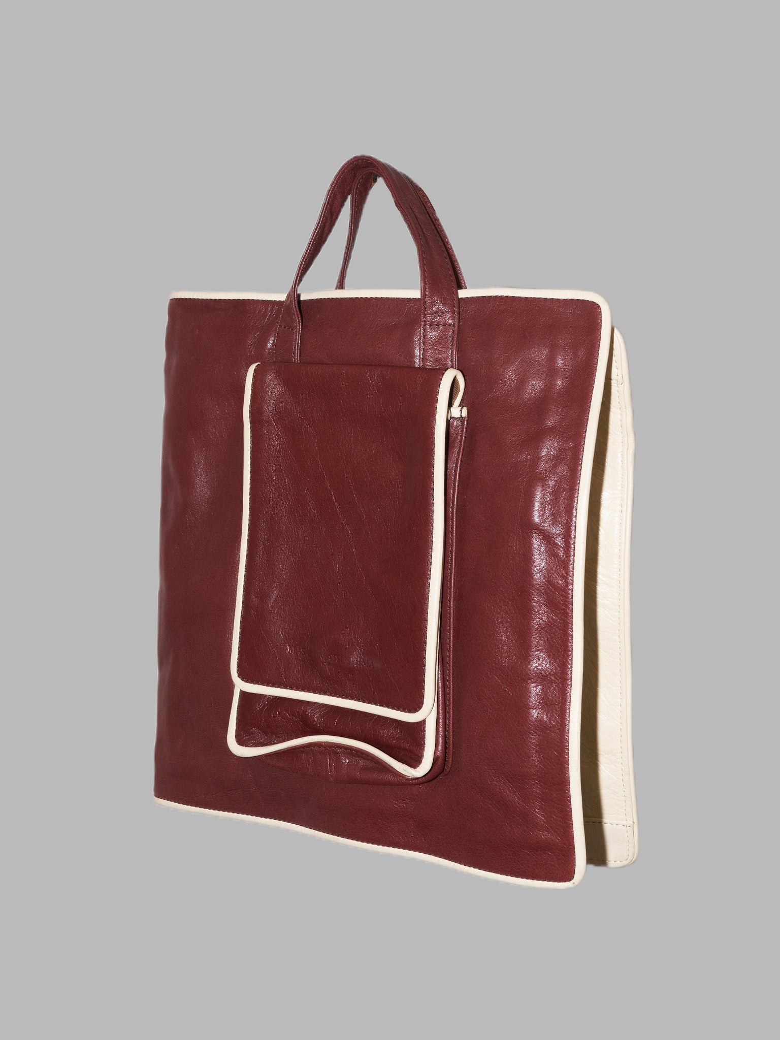 Masaki Matsushima Homme brown leather and canvas folded bag