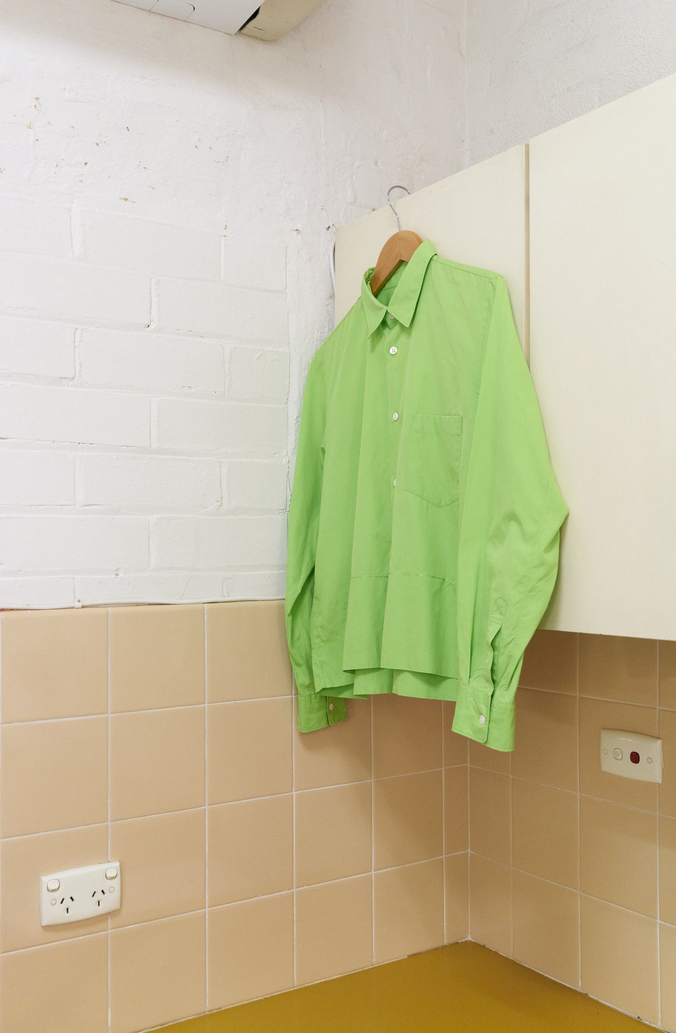 Comme des Garcons Homme Plus 1990s green cotton shirt with folded and embroidered hem