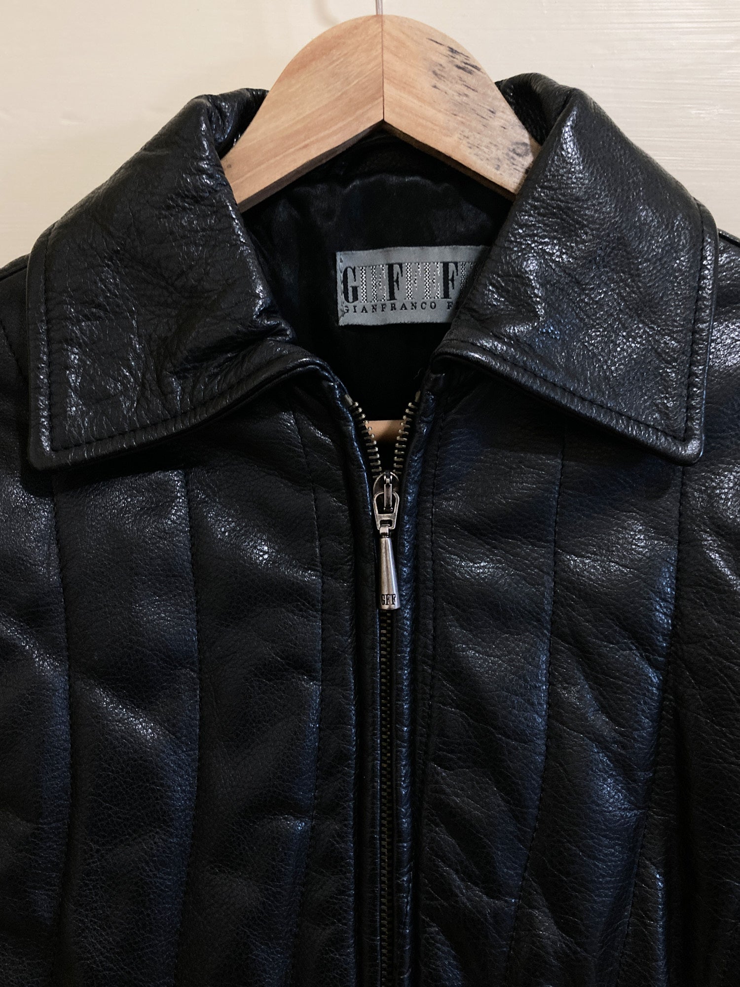 Gianfranco Ferre black zipped leather jacket with undulating channel stitch - S