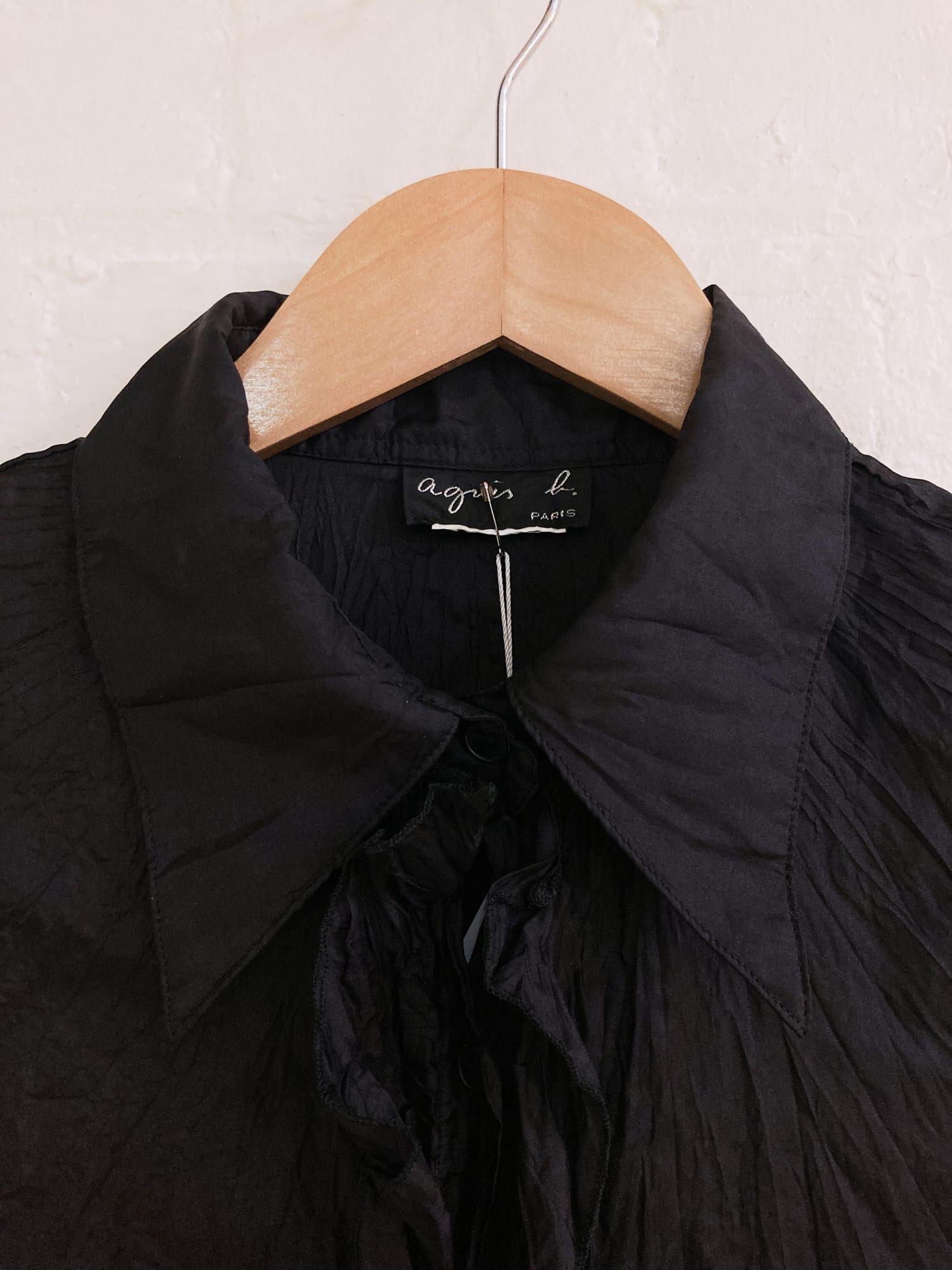 Agnes B Paris 1990s black creased silk shirt with collar ruffle