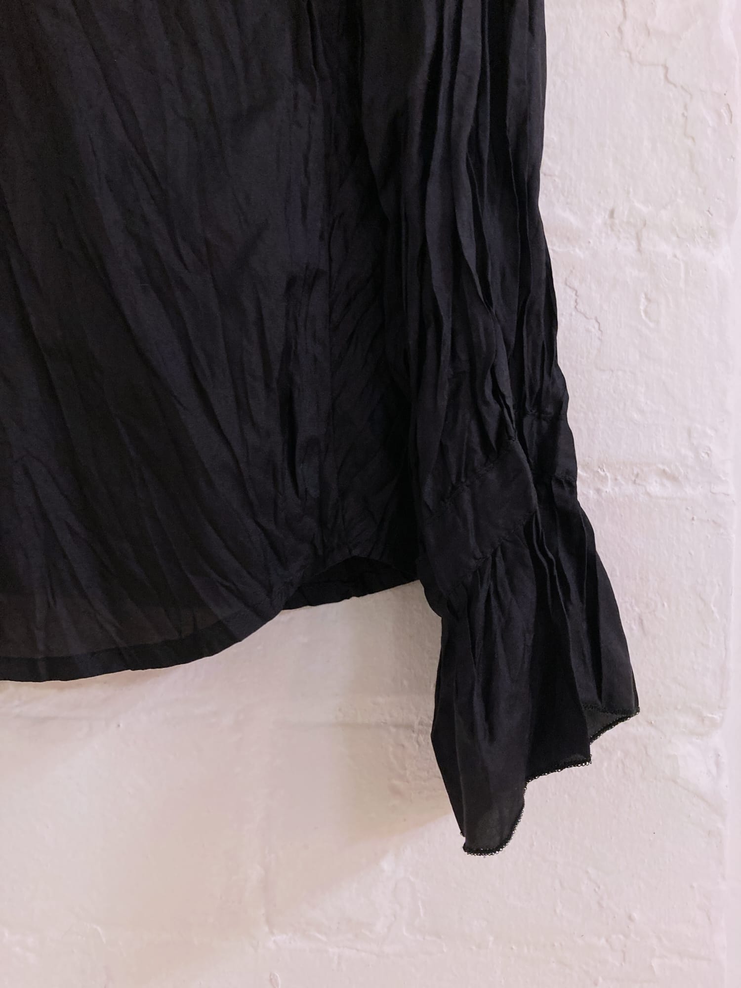 Agnes B Paris 1990s black creased silk shirt with collar ruffle
